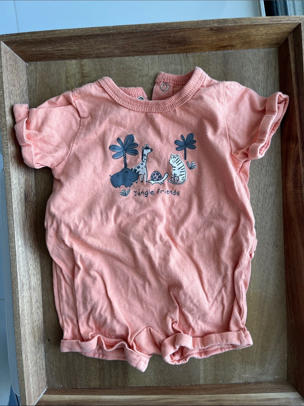Peach-orange romper